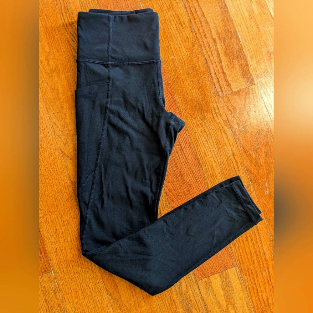 Athleta Salutation Stash Pocket Tight sz small